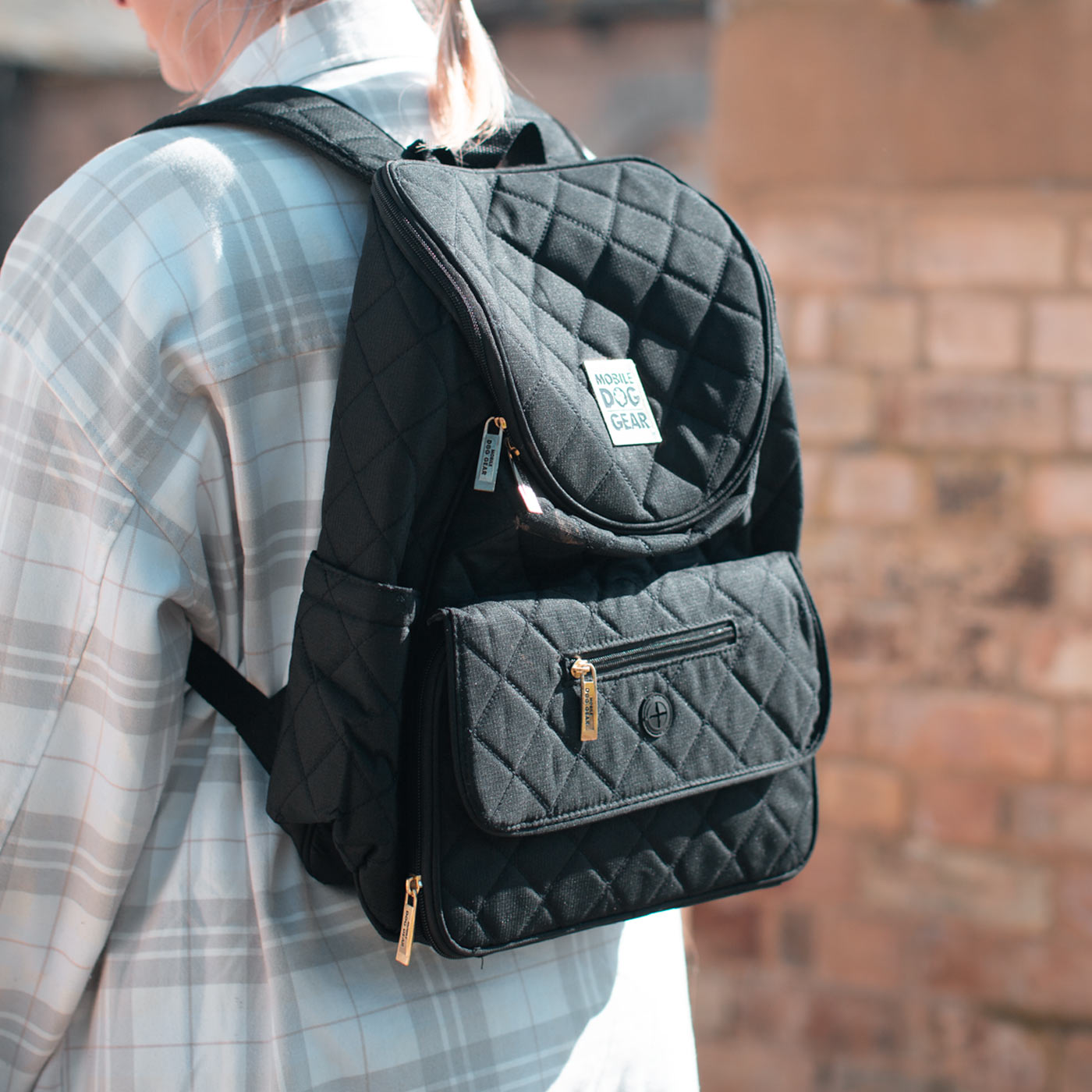 Discover, Mobile Dog Gear Weekender Backpack, in Black. The Perfect Away Bag for any Pet Parent, Featuring dividers to stack food and built in waste bag dispenser. Also Included feeding set, collapsible silicone bowls and placemat! The Perfect Gift For travel, meets airline requirements. Available Now at Lords & Labradors US