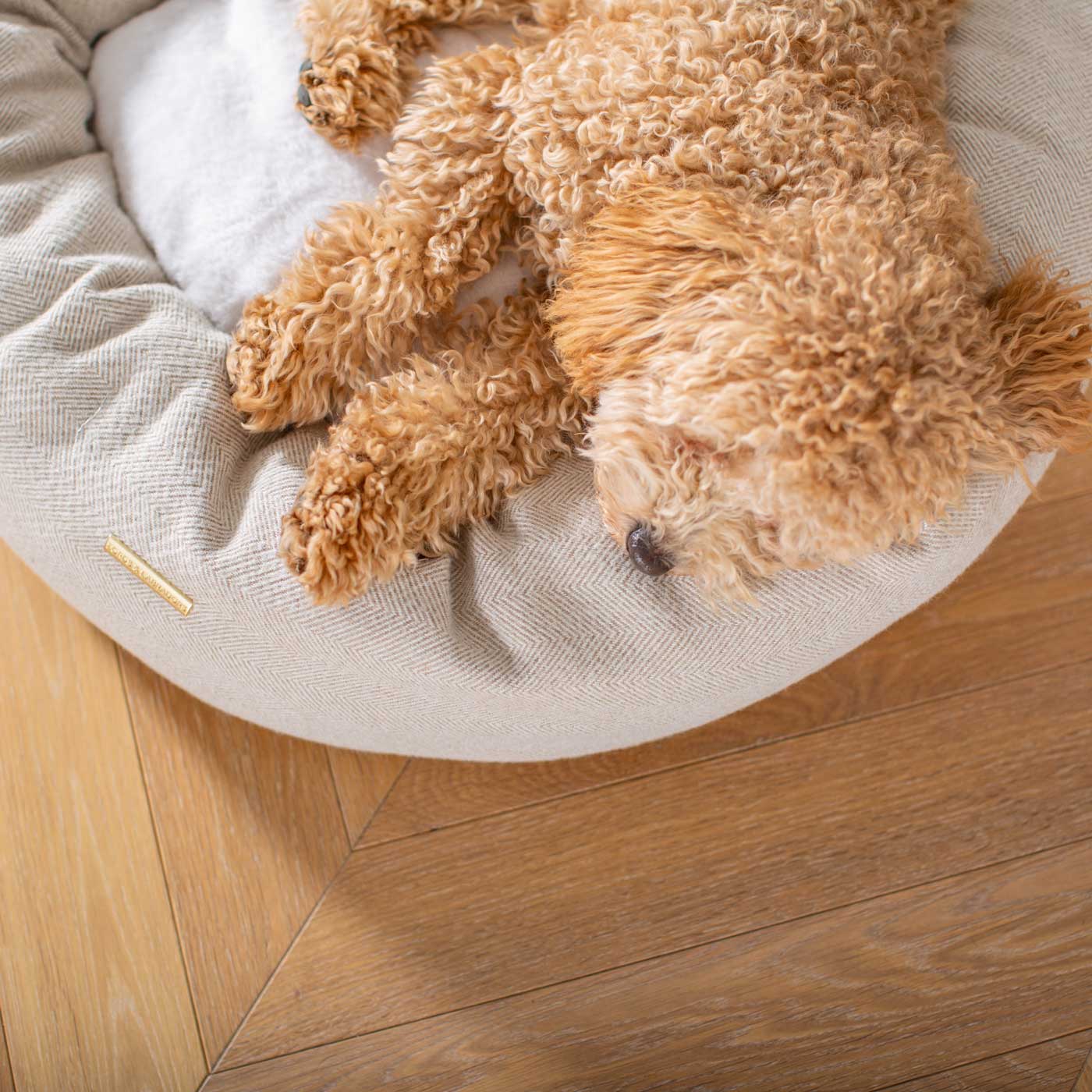 Discover Our Handmade Luxury Donut Dog Bed, In Natural Herringbone Tweed, The Perfect Choice For Puppies Available Now at Lords & Labradors US