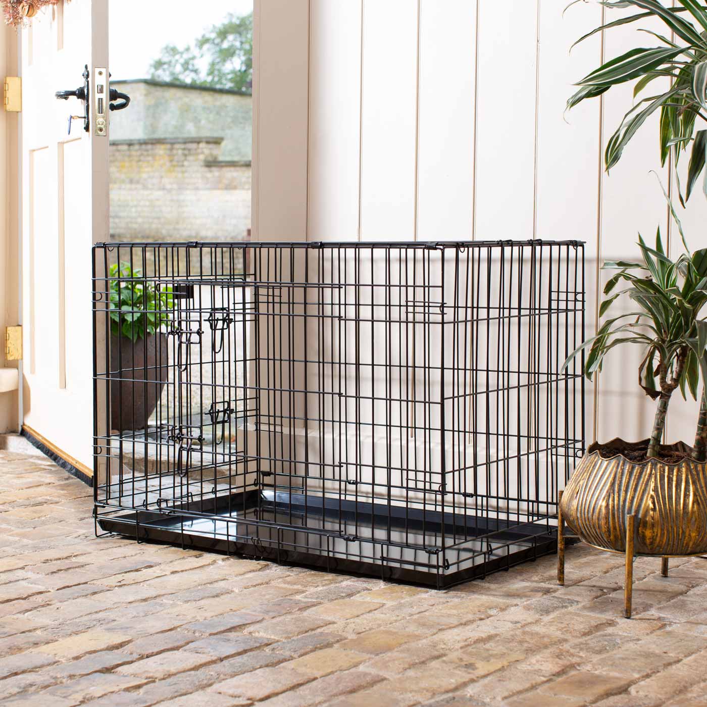 Discover the perfect deluxe heavy duty Black dog cage, featuring two doors for easy access and a removable tray for easy cleaning! The ideal choice to keep new puppies safe, made using pet safe galvanised steel! Available now in 5 sizes and three stunning colors at Lords & Labradors US