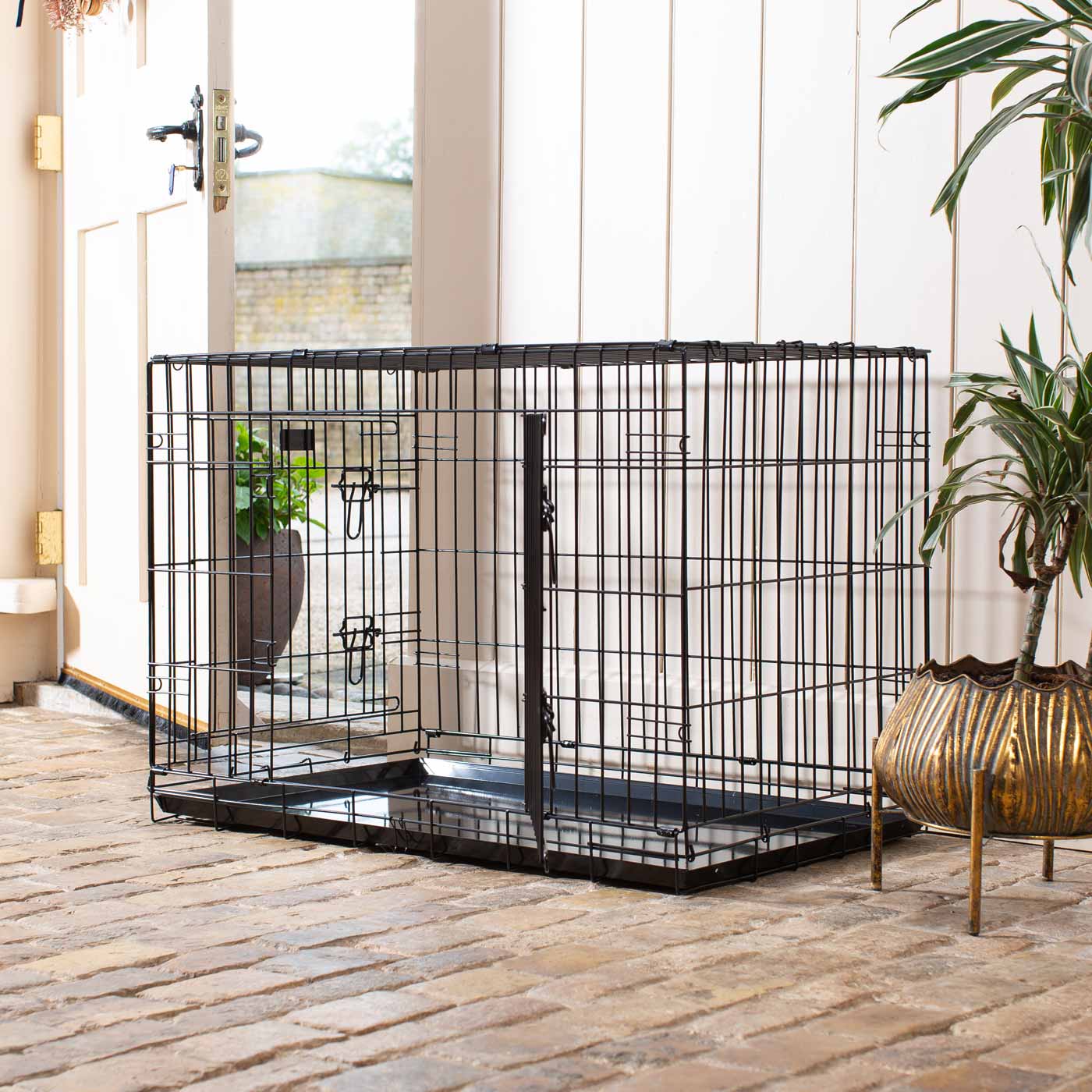 Discover the perfect deluxe heavy duty Black dog cage, featuring two doors for easy access and a removable tray for easy cleaning! The ideal choice to keep new puppies safe, made using pet safe galvanised steel! Available now in 5 sizes and three stunning colors at Lords & Labradors US