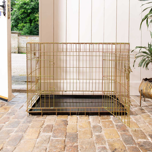 Discover the perfect deluxe heavy duty Gold dog cage, featuring two doors for easy access and a removable tray for easy cleaning! The ideal choice to keep new puppies safe, made using pet safe galvanised steel! Available now in 5 sizes and three stunning colors at Lords & Labradors US