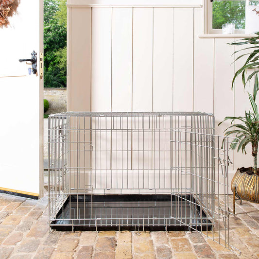 Discover the perfect deluxe heavy duty silver dog cage, featuring two doors for easy access and a removable tray for easy cleaning! The ideal choice to keep new puppies safe, made using pet safe galvanised steel! Available now in 5 sizes and three stunning colors at Lords & Labradors US