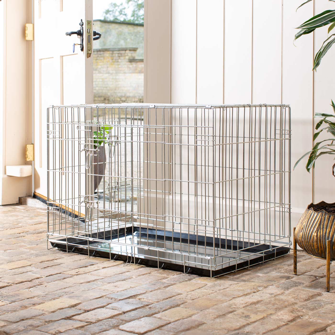 Discover the perfect deluxe heavy duty silver dog cage, featuring two doors for easy access and a removable tray for easy cleaning! The ideal choice to keep new puppies safe, made using pet safe galvanised steel! Available now in 5 sizes and three stunning colors at Lords & Labradors US