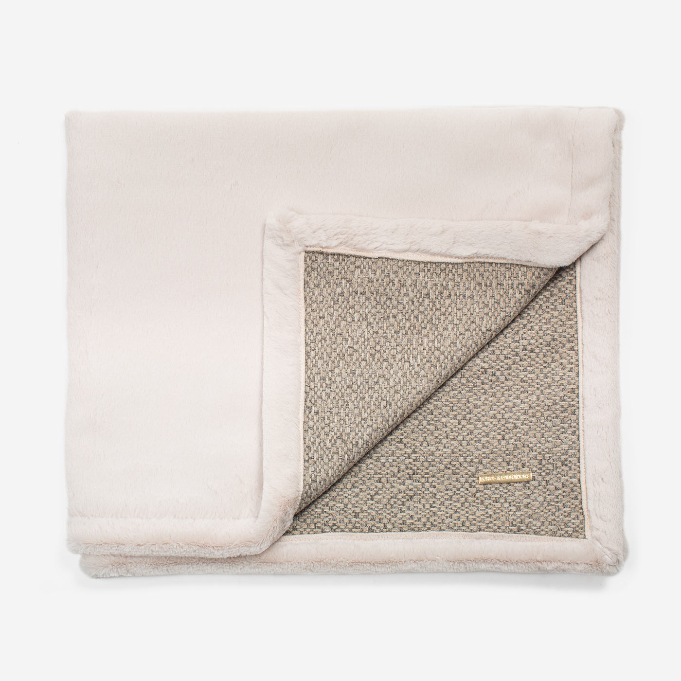 Present your furry friend with our luxuriously thick, plush blanket for your pet. Featuring a reverse side with hardwearing woven fabric handmade in Italy for the perfect high-quality pet blanket! Essentials Herdwick Blanket In Pebble, Available now at Lords & Labradors US