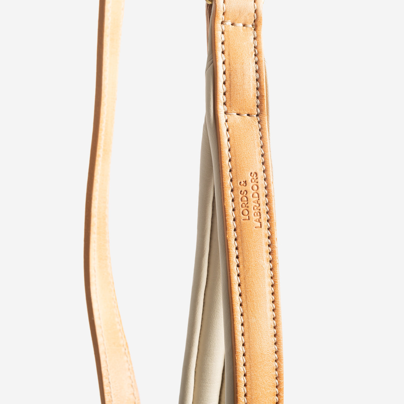 Discover dog walking luxury with our handcrafted Italian padded leather dog Leash in Tan & Cream! The perfect Leash for dogs available now at Lords & Labradors US