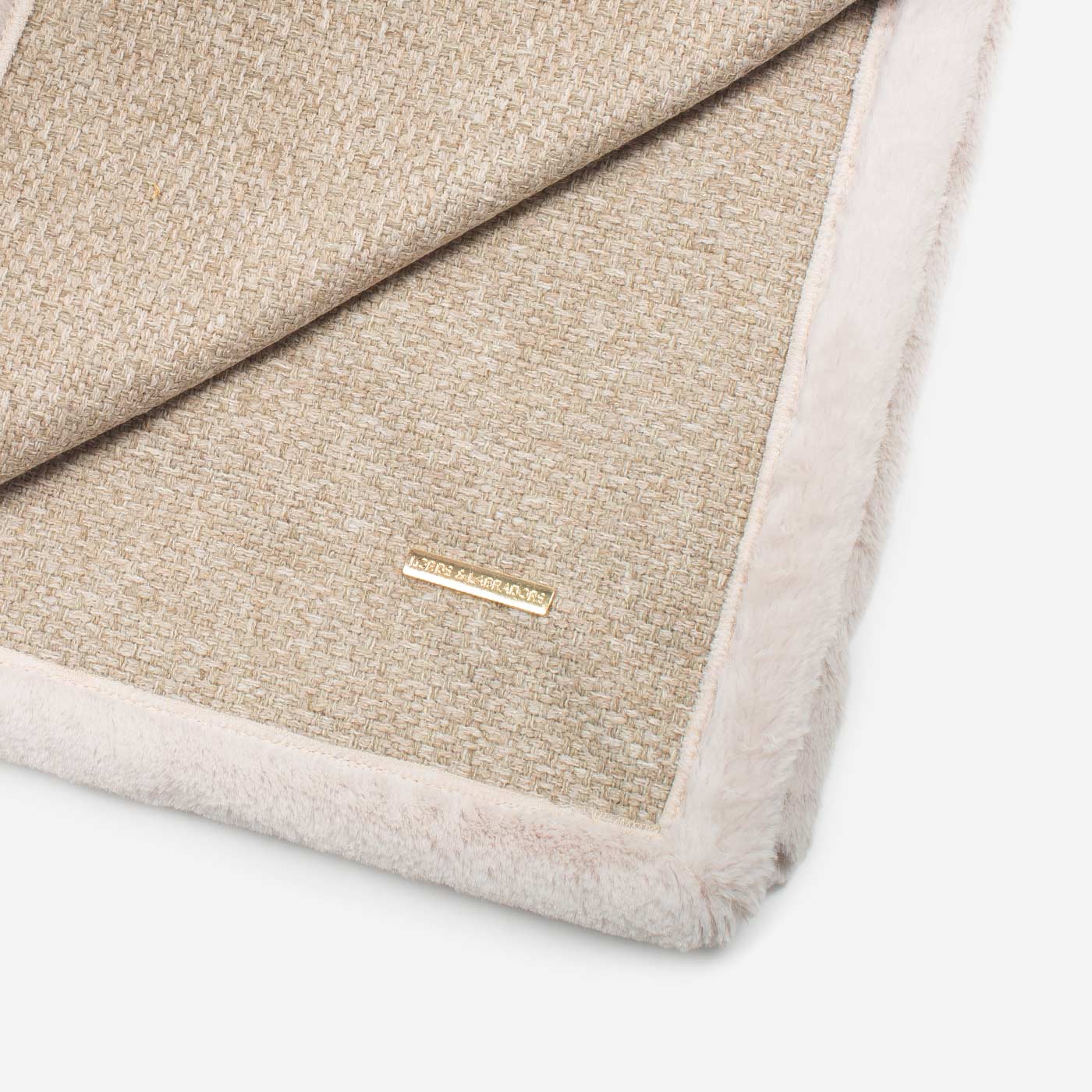 Present your furry friend with our luxuriously thick, plush blanket for your pet. Featuring a reverse side with hardwearing woven fabric handmade in Italy for the perfect high-quality pet blanket! Essentials Herdwick Blanket In Sandstone, Available now at Lords & Labradors US