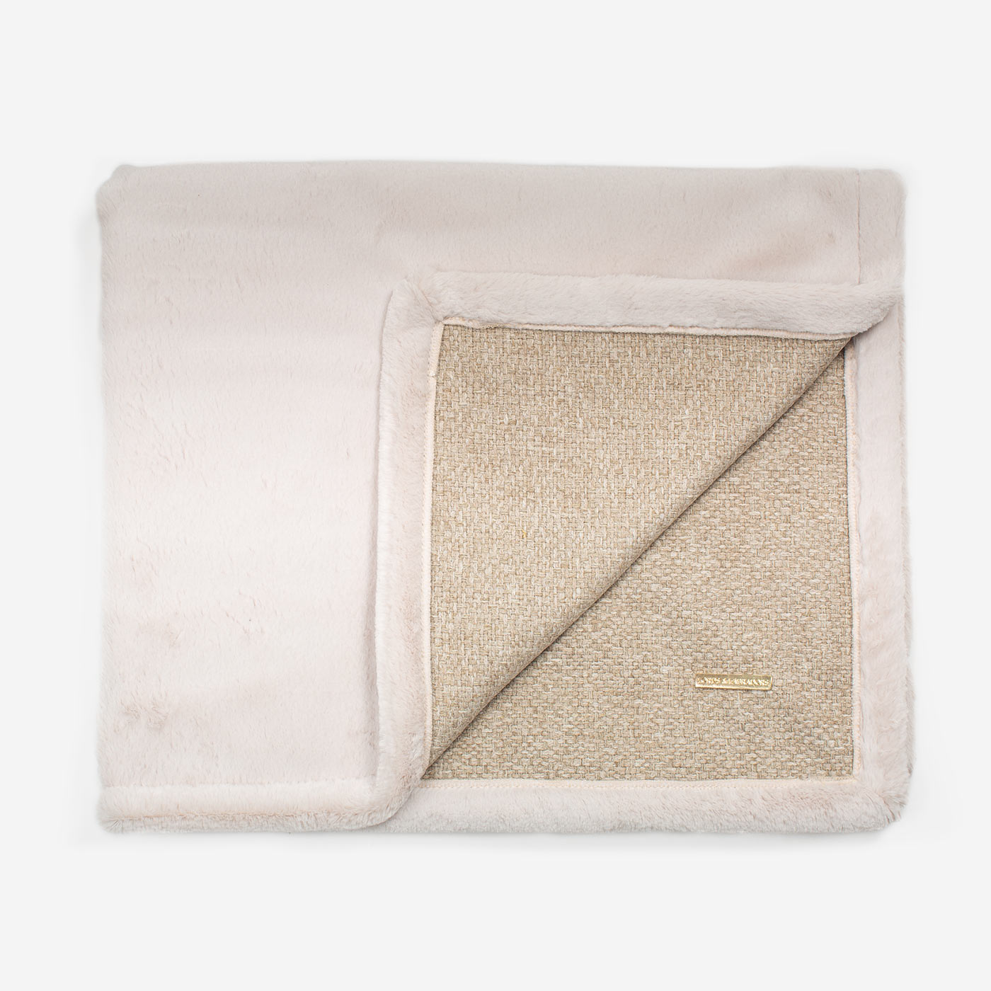 Present your furry friend with our luxuriously thick, plush blanket for your pet. Featuring a reverse side with hardwearing woven fabric handmade in Italy for the perfect high-quality pet blanket! Essentials Herdwick Blanket In Sandstone, Available now at Lords & Labradors US