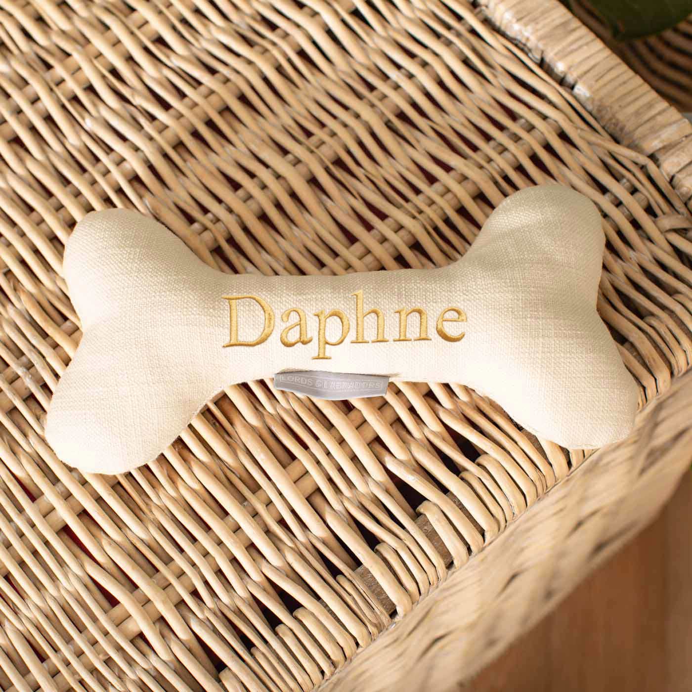 Present The Perfect Pet Playtime With Our Luxury Dog Bone Toy, In Stunning Savanna Bone! Available To Personalize Now at Lords & Labradors US