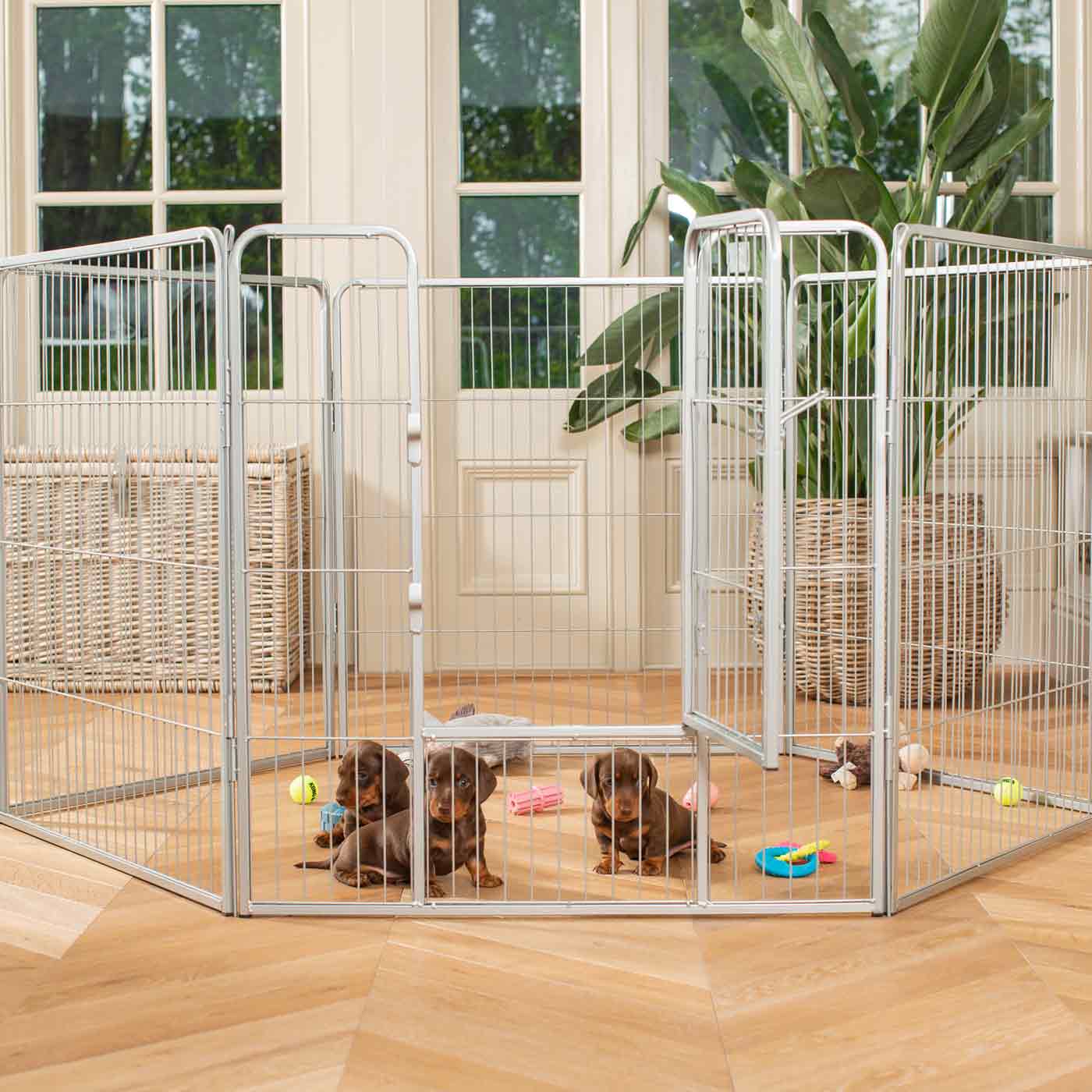 Ensure The Ultimate Puppy Safety with Our Heavy Duty 80cm High Silver Metal Play Pen, Crafted to Take Your Pet Right Through Maturity! Powder Coated to Be Extra Hardwearing! 6 panels that are 80cm high and attachments to connect to any cage. The modular system allows you to change the puppy pen shape with multiple layouts! Available To Now at Lords & Labradors US