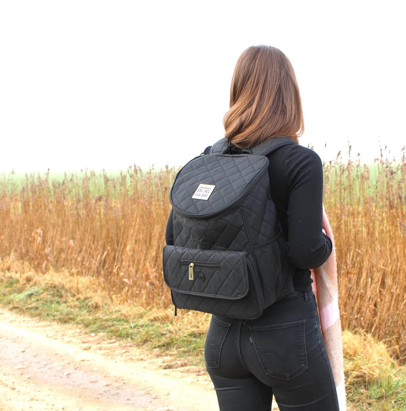 Discover, Mobile Dog Gear Weekender Backpack, in Black. The Perfect Away Bag for any Pet Parent, Featuring dividers to stack food and built in waste bag dispenser. Also Included feeding set, collapsible silicone bowls and placemat! The Perfect Gift For travel, meets airline requirements. Available Now at Lords & Labradors US