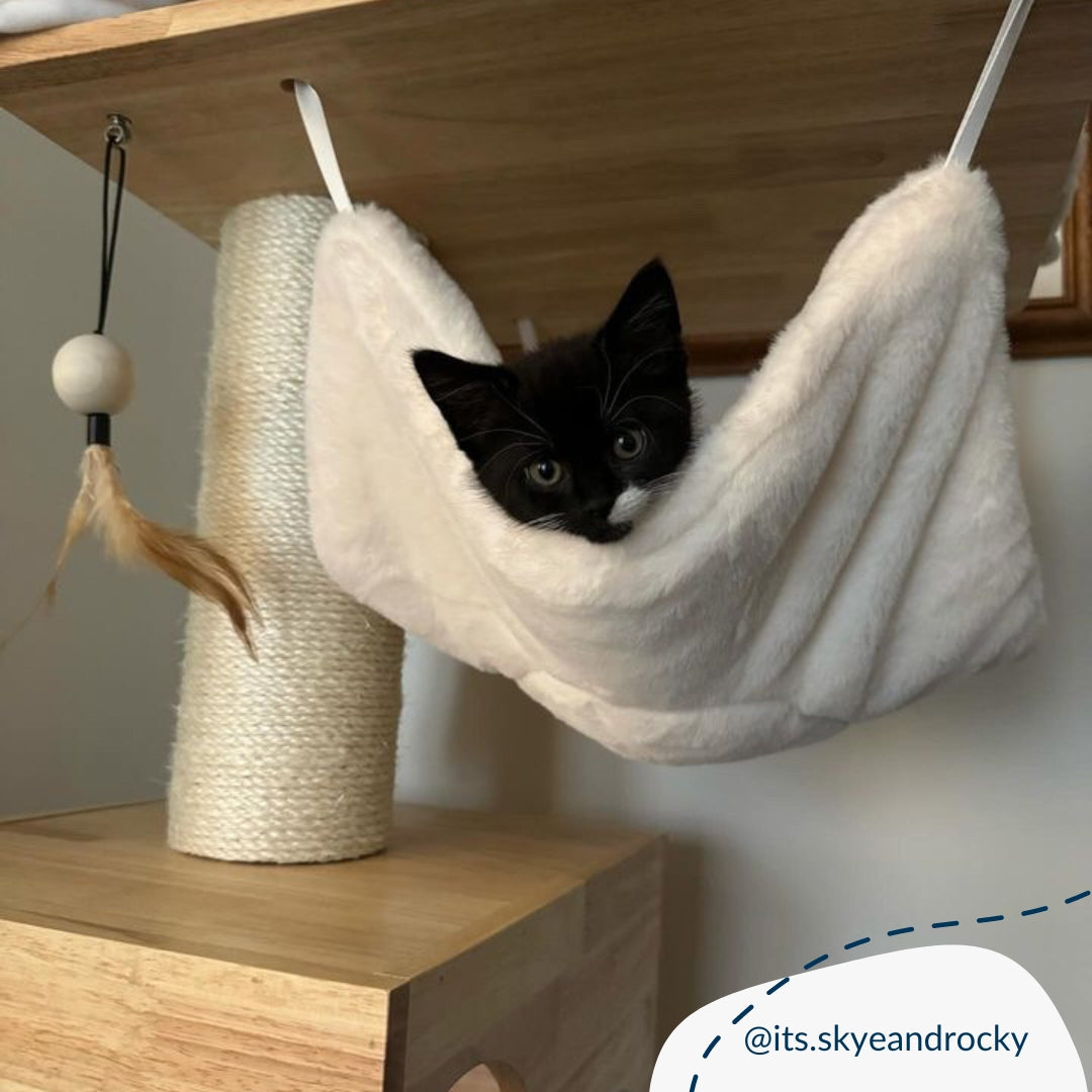 Discover the Ultimate Cat Tree, The Helsinki The Levels Cat Play Centre. Present your cat with the perfect cat play centre! Crafted using durable and long-lasting wood, this modern cat play centre features hanging toys to hangout spots, multiple levels for cats to explore, soft, plush hammock to snuggle into and sisal wrapped post for scratching! Available Now at Lords & Labradors US