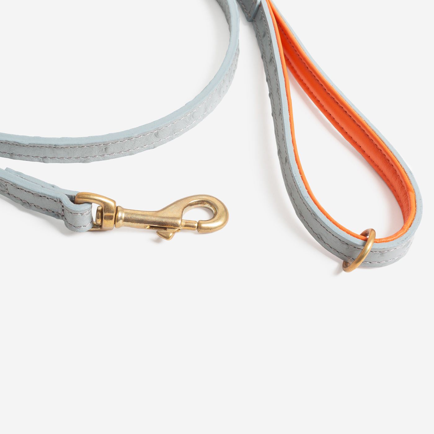 Discover dog walking luxury with our handcrafted Italian Ostrich leather dog Leash in Grey & Orange! The perfect Leash for dogs available now at Lords & Labradors US