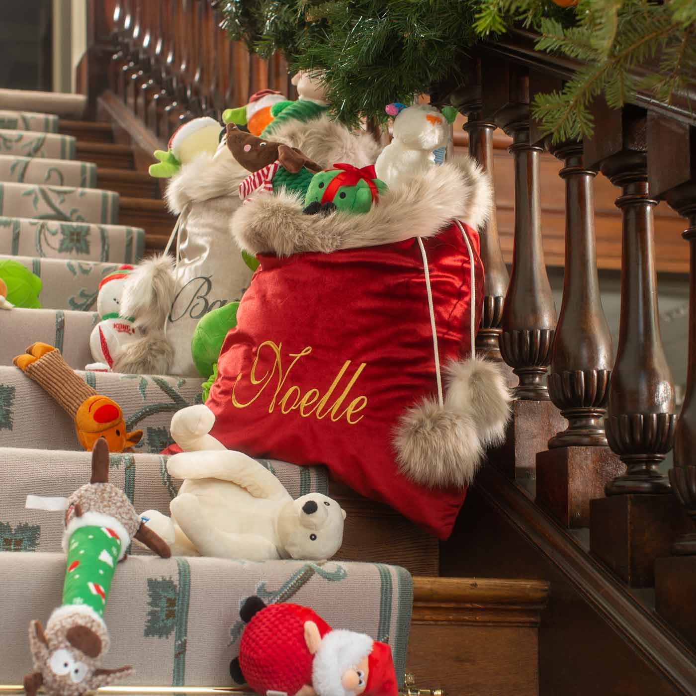 Discover our Christmas Santa Sack in Cranberry Velvet featuring drawstring tightening. The perfect Luxury pet gift for your Dog, Cat, Family and Fiends, now available to Personalize at Lords & Labradors US