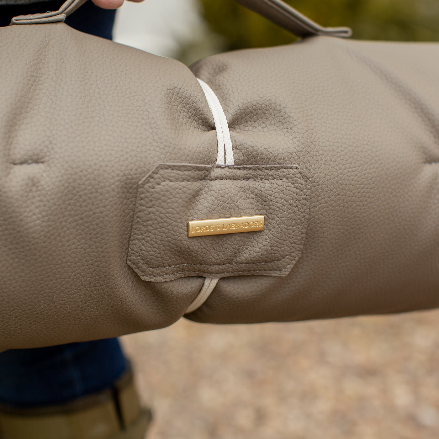 Embark on the perfect pet travel with our luxury Travel Mat in Rhino Camel. Featuring a Carry handle for on the move once Rolled up for easy storage, can be used as a seat cover, boot mat or travel bed! Available now at Lords & Labradors US