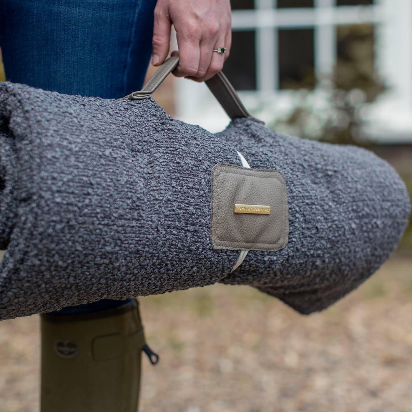 Embark on the perfect pet travel with our luxury Travel Mat in Granite Boucle. Featuring a Carry handle for on the move once Rolled up for easy storage, can be used as a seat cover, boot mat or travel bed! Available now at Lords & Labradors US