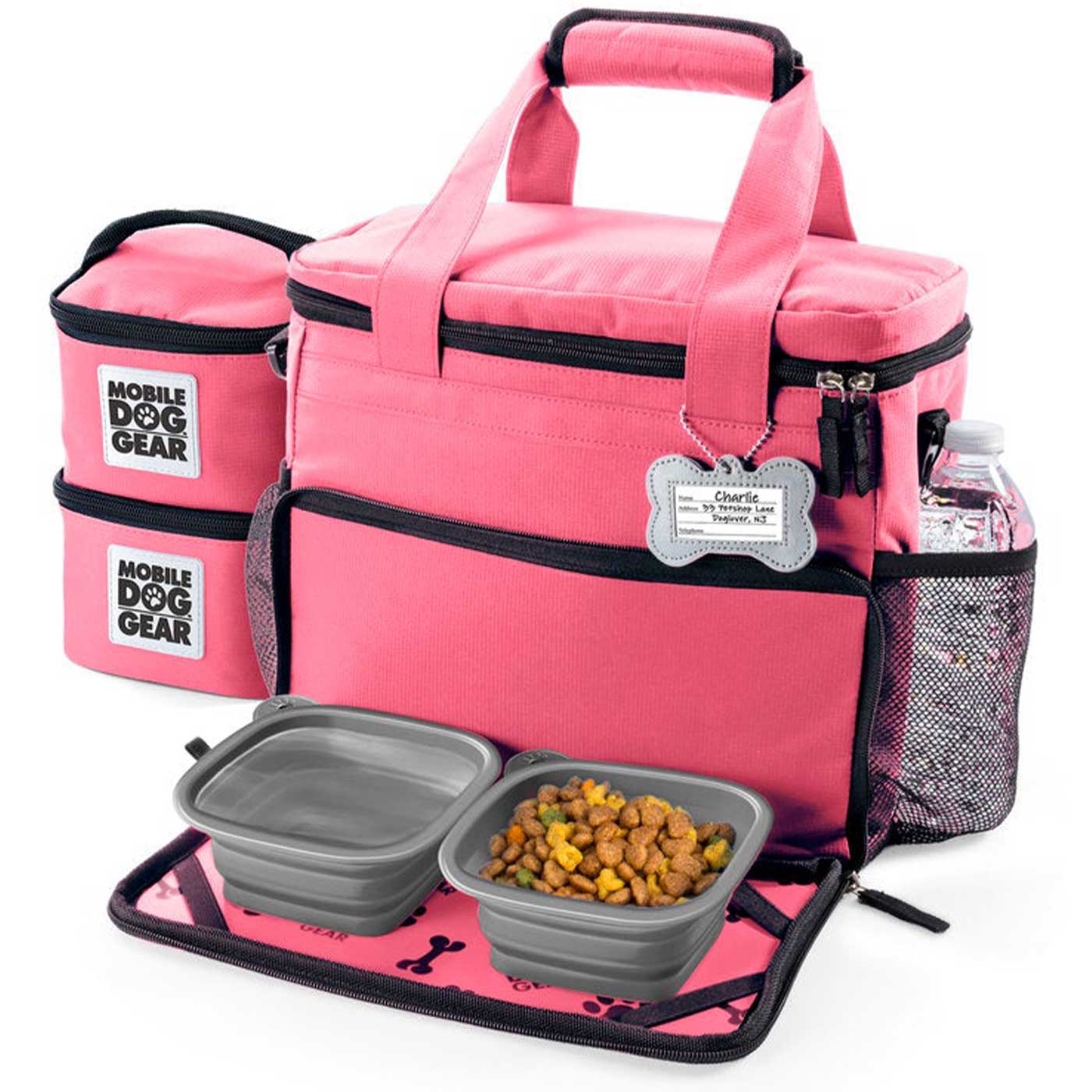 Discover, Mobile Dog Gear Week Away Bag, in Pink. The Perfect Away Bag for any Pet Parent, Featuring dividers to stack food and built in waste bag dispenser. Also Included feeding set, collapsible silicone bowls and placemat! The Perfect Gift For travel, meets airline requirements. Available Now at Lords & Labradors US