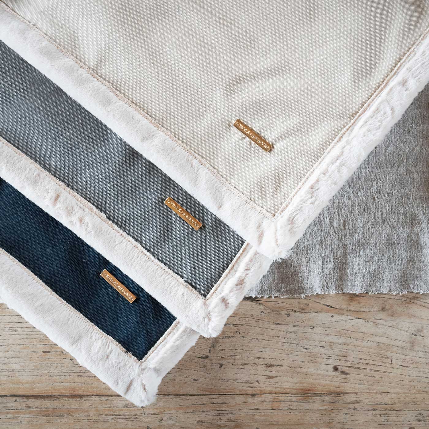 Present your furry friend with our luxuriously thick, plush blanket for your pet. Featuring a reverse side with hardwearing woven fabric handmade in Italy for the perfect high-quality pet blanket! Essentials Twill Blanket In Linen, Available now at Lords & Labradors US