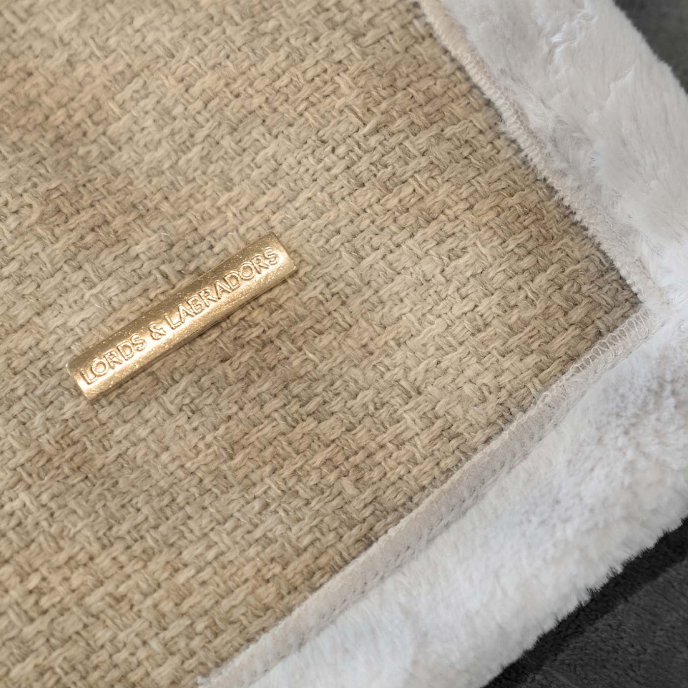 Present your furry friend with our luxuriously thick, plush blanket for your pet. Featuring a reverse side with hardwearing woven fabric handmade in Italy for the perfect high-quality pet blanket! Essentials Herdwick Blanket In Sandstone, Available now at Lords & Labradors US