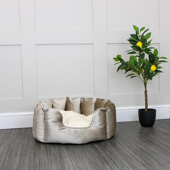 Discover the perfect high wall dog bed in the beautifully crafted Velvet collection, in Mushroom. This comfortable and cozy bed for dogs features an inner pillow with a plush fleece on the other side for a luxurious touch! Available to personalize now at Lords & Labradors US
