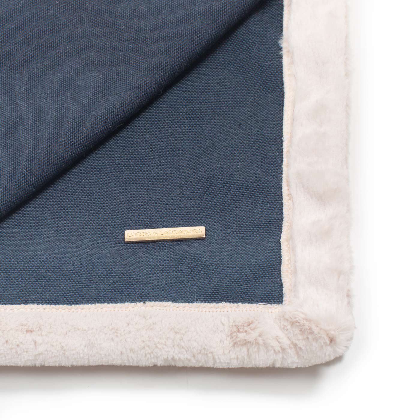 Present your furry friend with our luxuriously thick, plush blanket for your pet. Featuring a reverse side with hardwearing woven fabric handmade in Italy for the perfect high-quality pet blanket! Essentials Twill Blanket In Denim, Available now at Lords & Labradors US