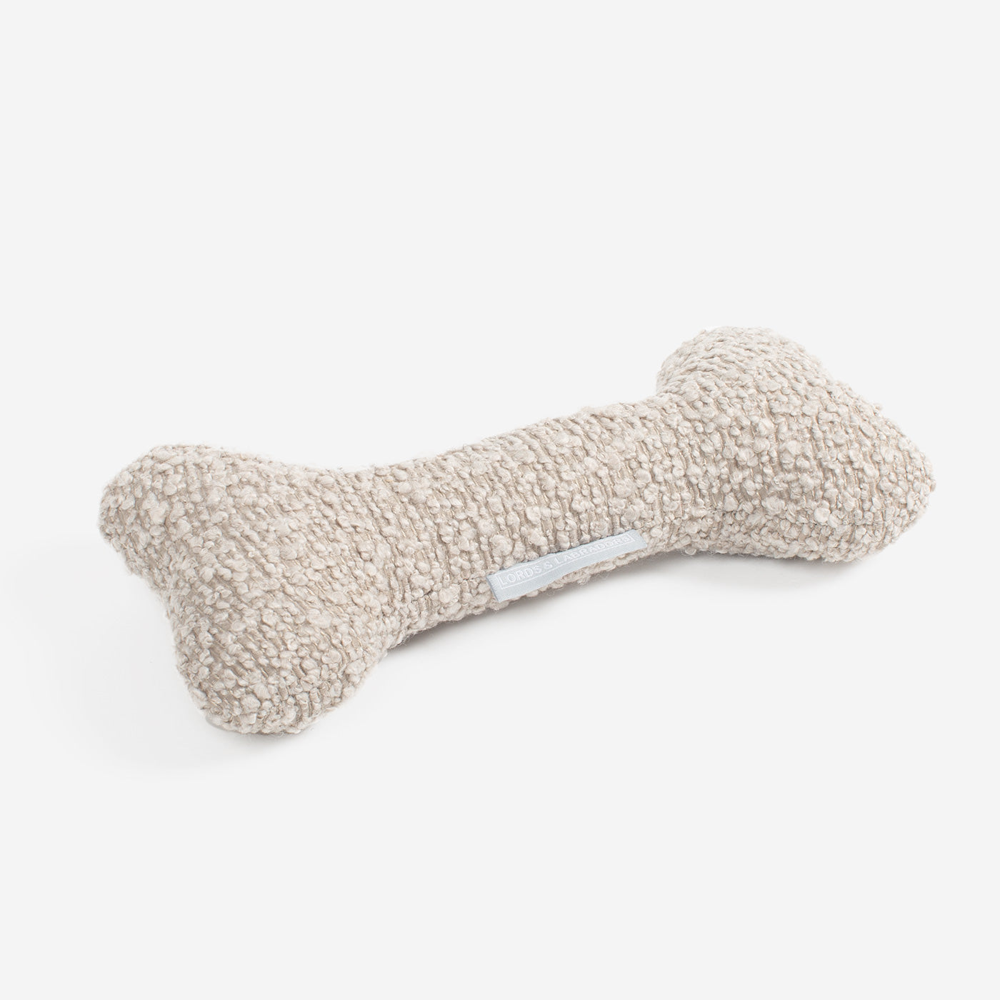 [color:mink boucle] [color:mink boucle] Present The Perfect Pet Playtime With Our Luxury Dog Bone Toy, In Stunning Mink Boucle! Available To Personalize Now at Lords & Labradors US