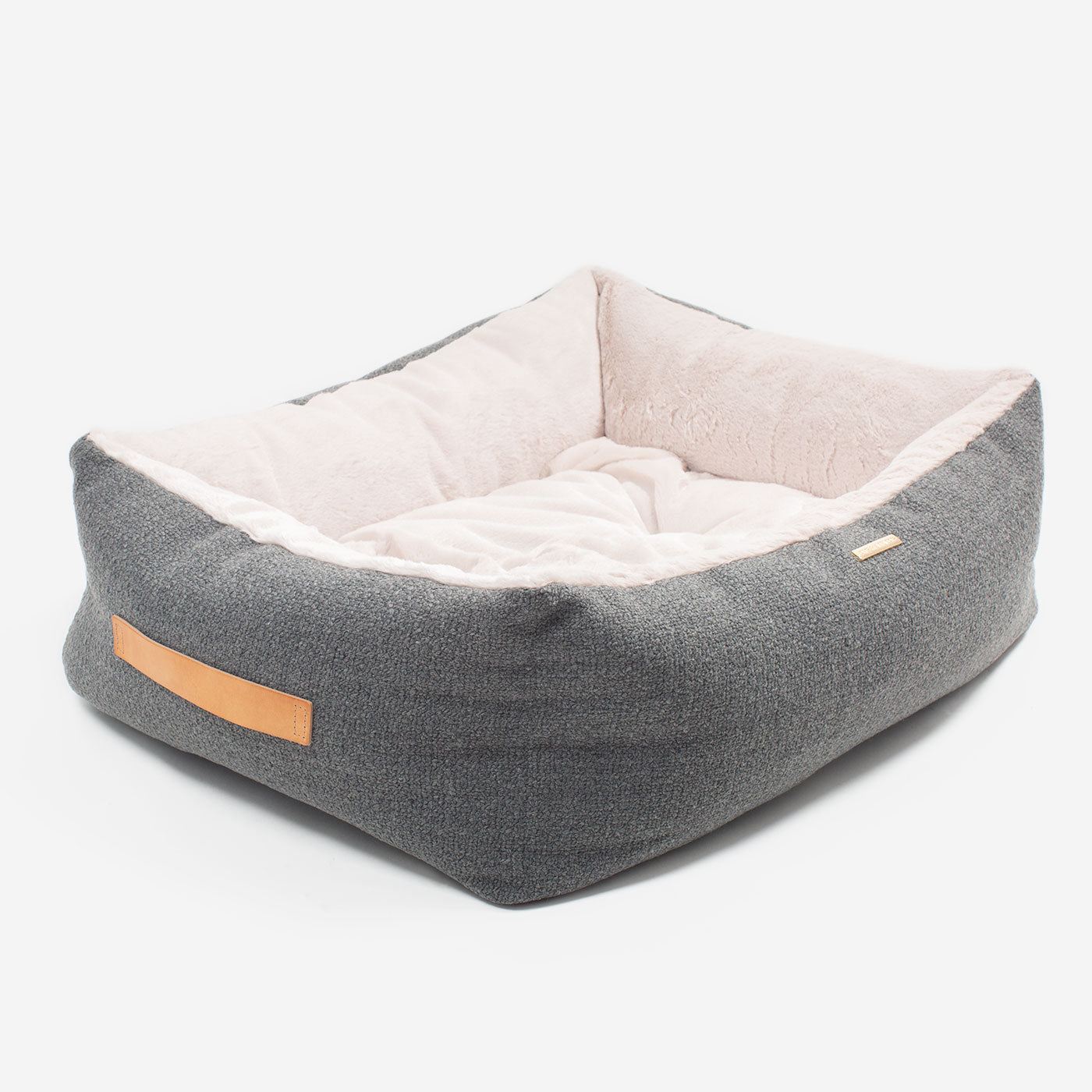 Present your furry friend with our luxuriously thick, plush Essentials Herdwick Box Bed in Graphite. Featuring a reversible inner cushion, along with Convenient carry handles on either side. This is a hardwearing woven fabric handmade in Italy for the perfect high-quality. now available at Lords and Labradors US