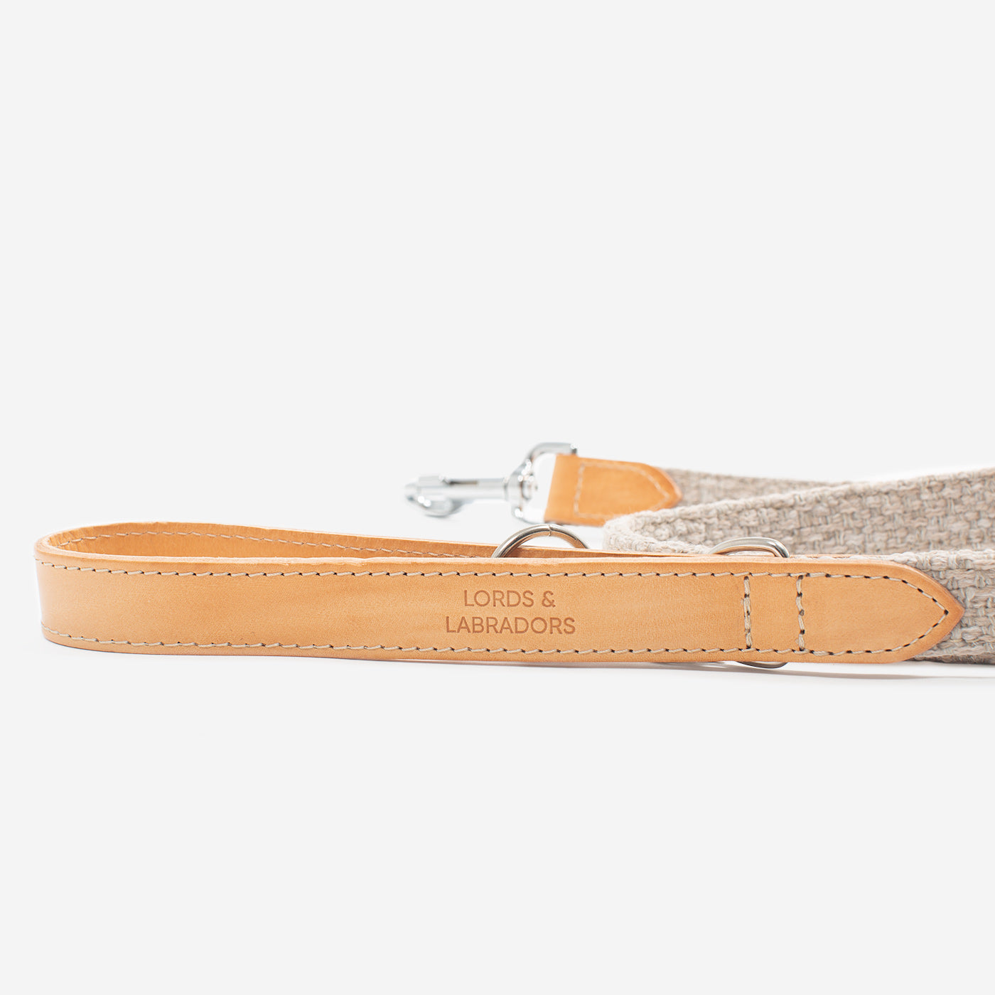 Discover dog walking luxury with our handcrafted Italian Herdwick dog leash in beautiful Sandstone with woven natural sandstone fabric! The perfect leash for dogs available now at Lords & Labradors US