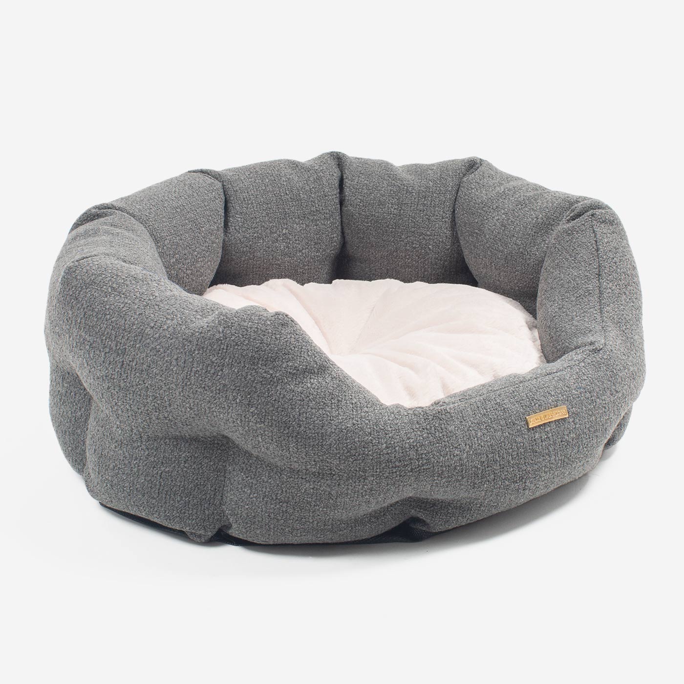 Discover our luxury Herdwick oval dog bed in beautiful graphite, the ideal choice for dogs to enjoy blissful nap-time, featuring reversible inner cushion with raised sides for dogs who love to rest their head for the ultimate cosiness! Handcrafted in Italy for pure pet luxury! Available now at Lords & Labradors US