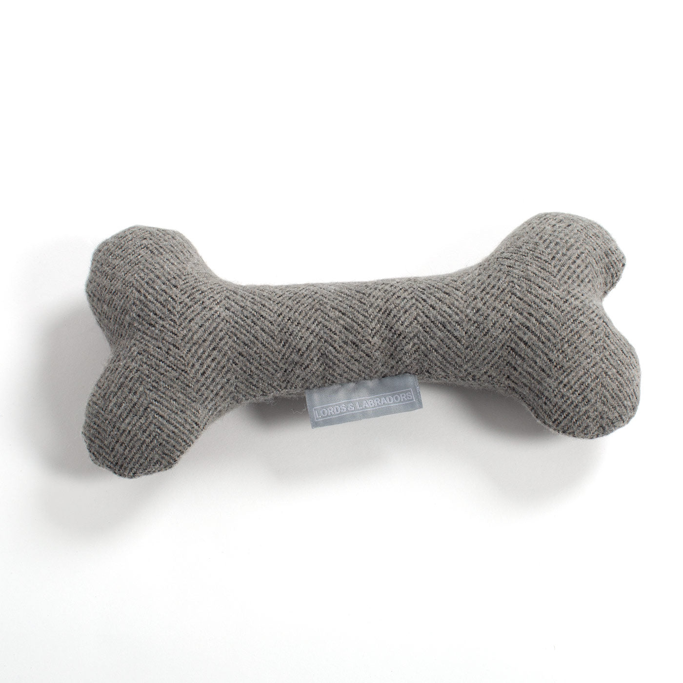 [color:pewter herringbone]  Present The Perfect Pet Playtime With Our Luxury Dog Bone Toy, In Stunning Pewter Herringbone Tweed! Available To Personalize Now at Lords & Labradors US