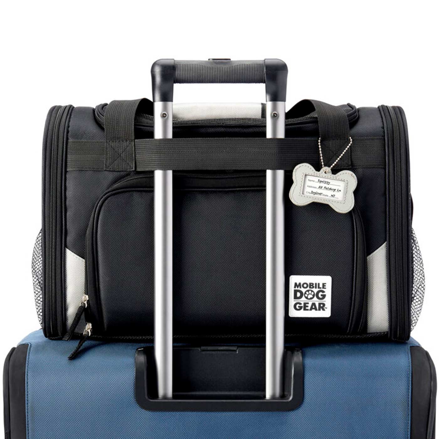 Discover, Mobile Dog Gear Pet Carrier, in Black. The Perfect Away Bag for any Pet Parent, Featuring dividers to stack food and removable padded Bottom. Also Included feeding set, collapsible silicone bowls and placemat! The Perfect Gift For travel, meets airline requirements. Available Now at Lords & Labradors US