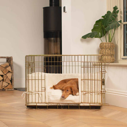 Discover Our Heavy-Duty Gold Dog Cage With Ivory Bouclé Cushion & Bumper! The Perfect Cage Accessories. Available To Personalize Here at Lords & Labradors US