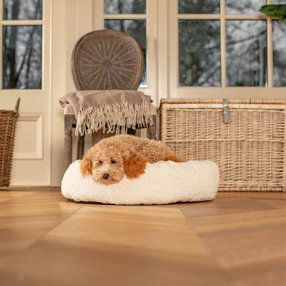 Discover Our Handmade Luxury Donut Dog Bed, In Ivory Bouclé, The Perfect Choice For Puppies Available Now at Lords & Labradors US