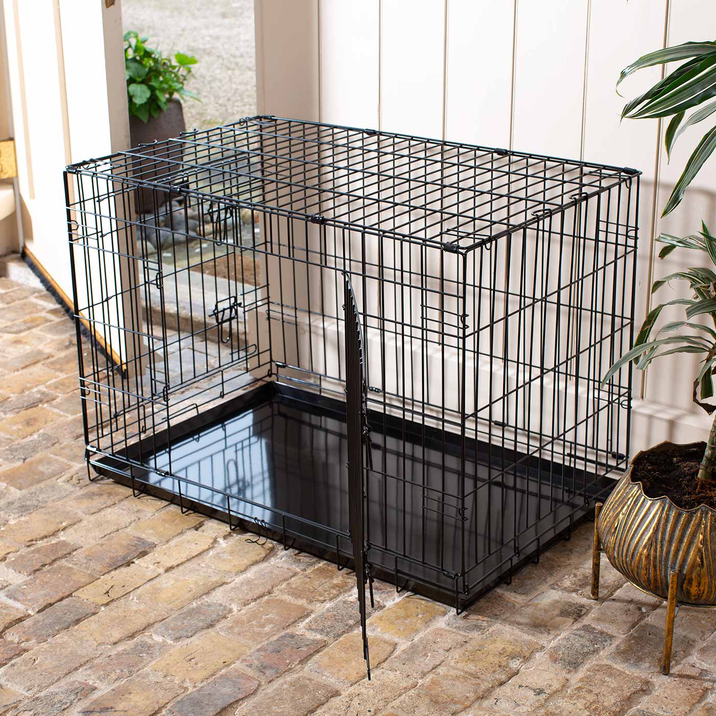 Discover the perfect deluxe heavy duty Black dog cage, featuring two doors for easy access and a removable tray for easy cleaning! The ideal choice to keep new puppies safe, made using pet safe galvanised steel! Available now in 5 sizes and three stunning colors at Lords & Labradors US