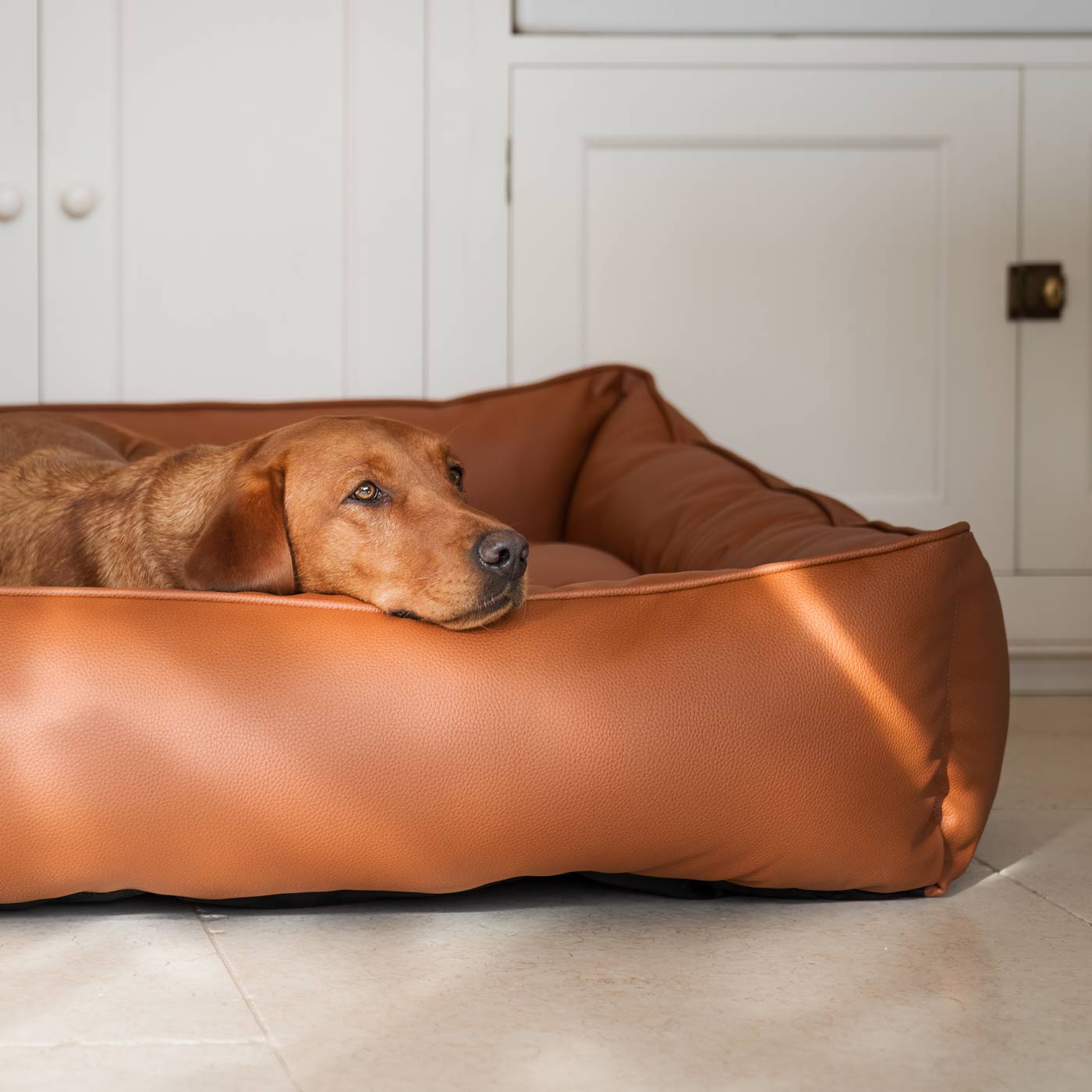 Luxury Handmade Box Bed in Rhino Tough Desert Faux Leather, in Ember, Perfect For Your Pets Nap Time! Available To Personalize at Lords & Labradors US