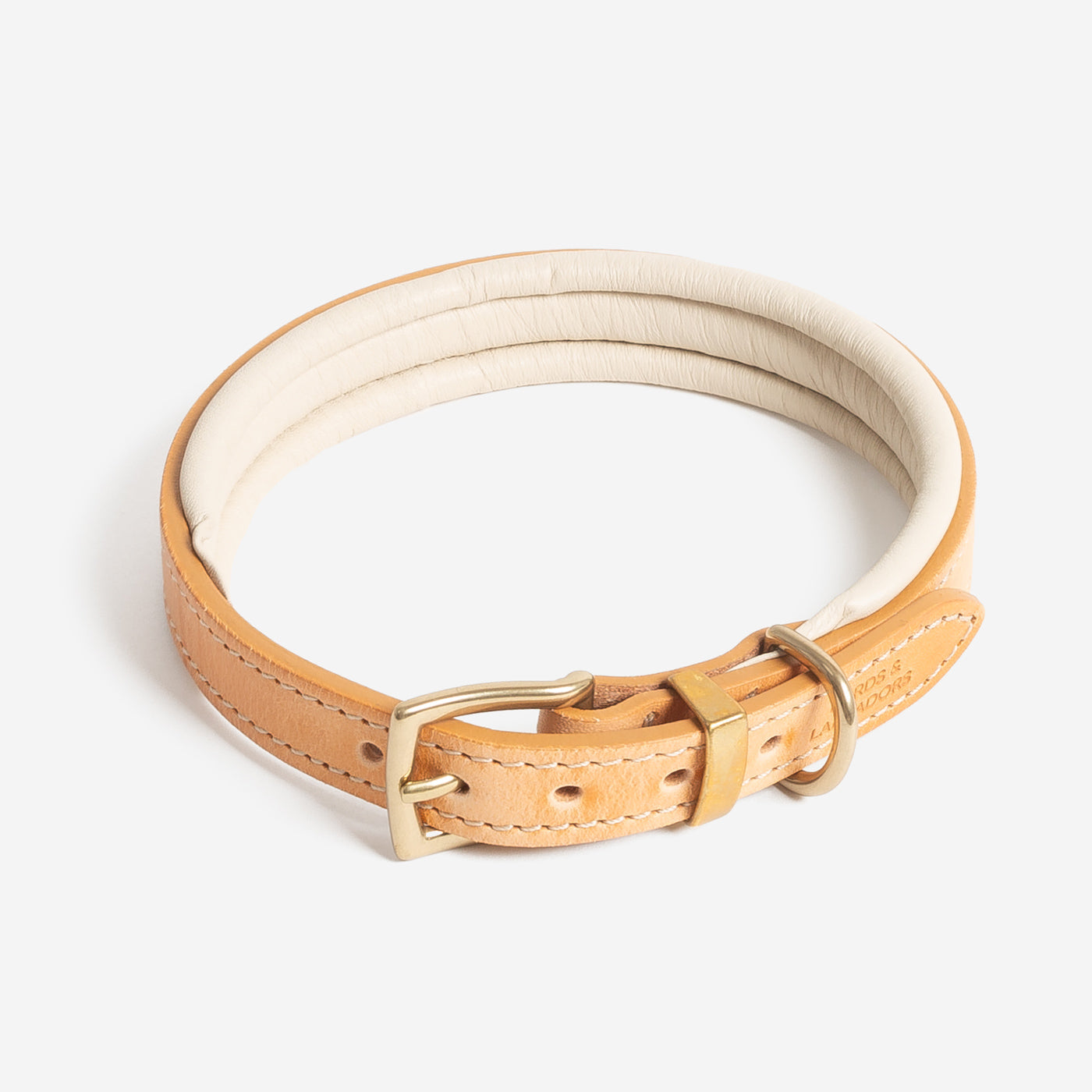 Discover dog walking luxury with our handcrafted Italian padded leather dog collar in Tan & Cream! The perfect collar for dogs available now at Lords & Labradors US