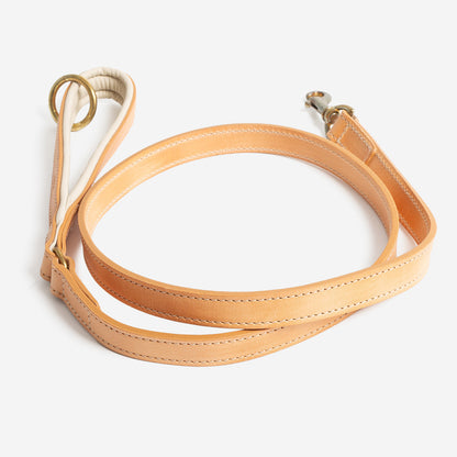 Discover dog walking luxury with our handcrafted Italian padded leather dog Leash in Tan & Cream! The perfect Leash for dogs available now at Lords & Labradors US 
