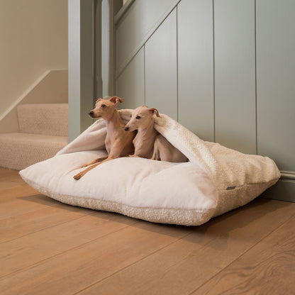 Luxury Ivory Boucle Sleepy Burrows, The Perfect bed For a Pet to Burrow. Available To Personalize In Stunning Ivory Bouclé Here at Lords & Labradors US