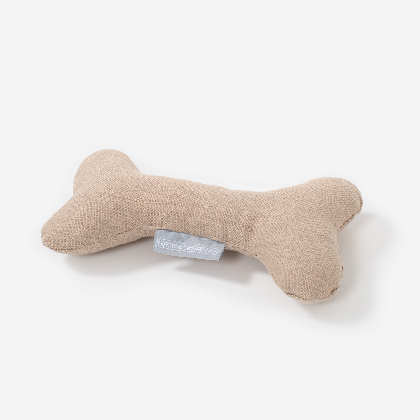 Present The Perfect Pet Playtime With Our Luxury Dog Bone Toy, In Stunning Savanna Oatmeal! Available To Personalize Now at Lords & Labradors US