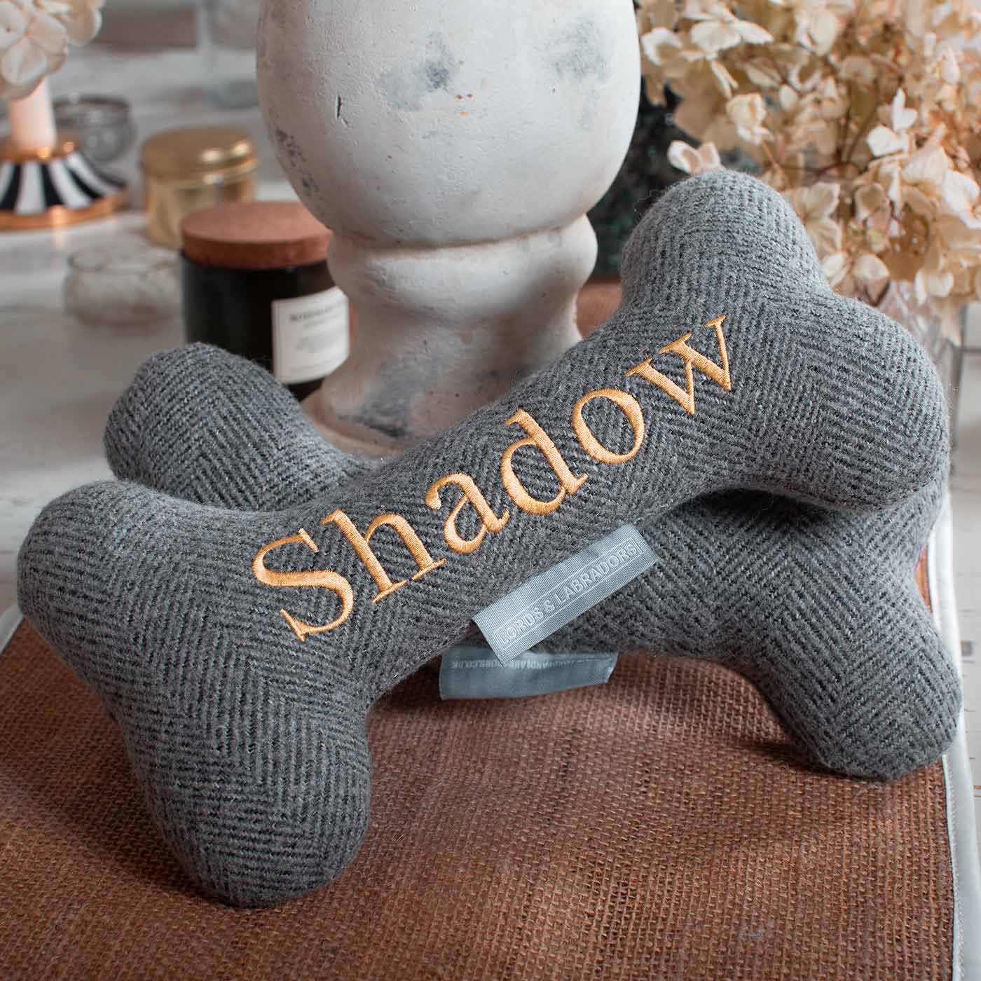 Present The Perfect Pet Playtime With Our Luxury Dog Bone Toy, In Stunning Pewter Herringbone Tweed! Available To Personalize Now at Lords & Labradors US