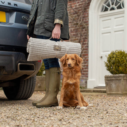 Embark on the perfect pet travel with our luxury Travel Mat in Essentials Light Grey. Featuring a Carry handle for on the move once Rolled up for easy storage, can be used as a seat cover, boot mat or travel bed! Available now at Lords & Labradors US