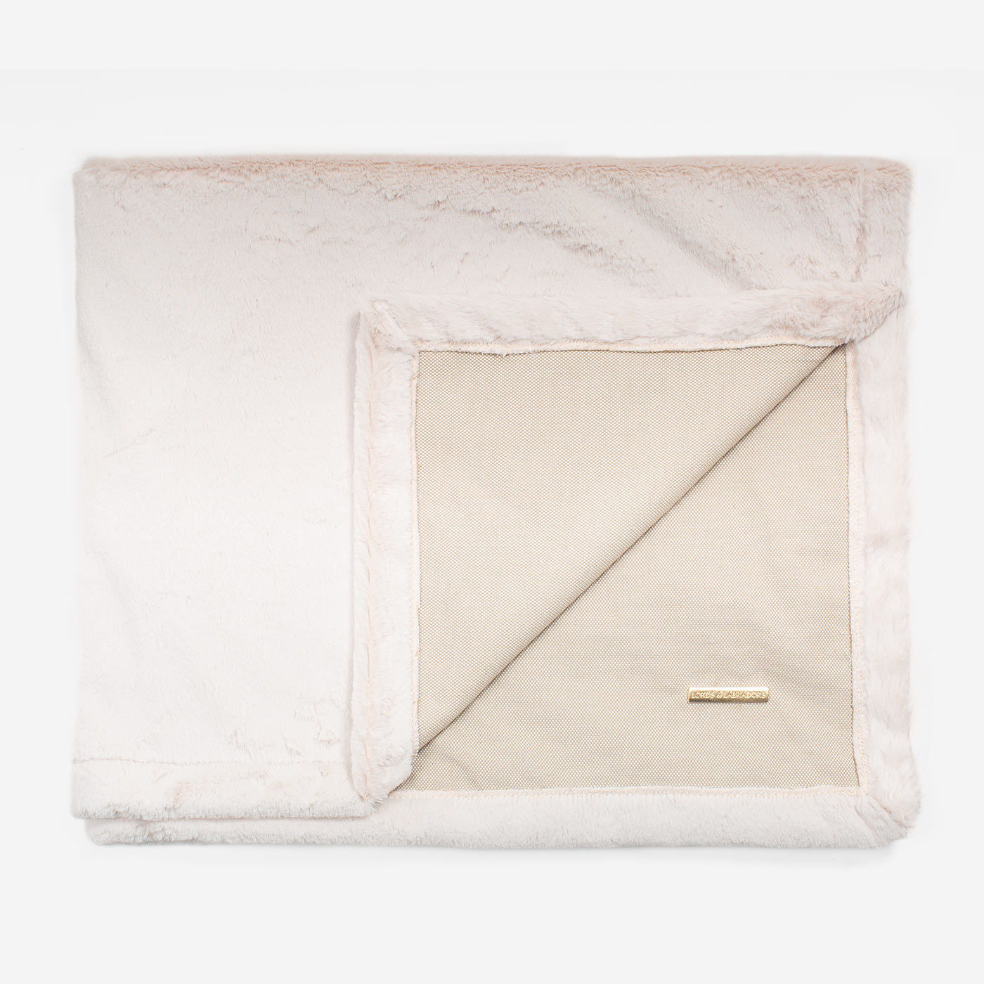 Present your furry friend with our luxuriously thick, plush blanket for your pet. Featuring a reverse side with hardwearing woven fabric handmade in Italy for the perfect high-quality pet blanket! Essentials Twill Blanket In Linen, Available now at Lords & Labradors US