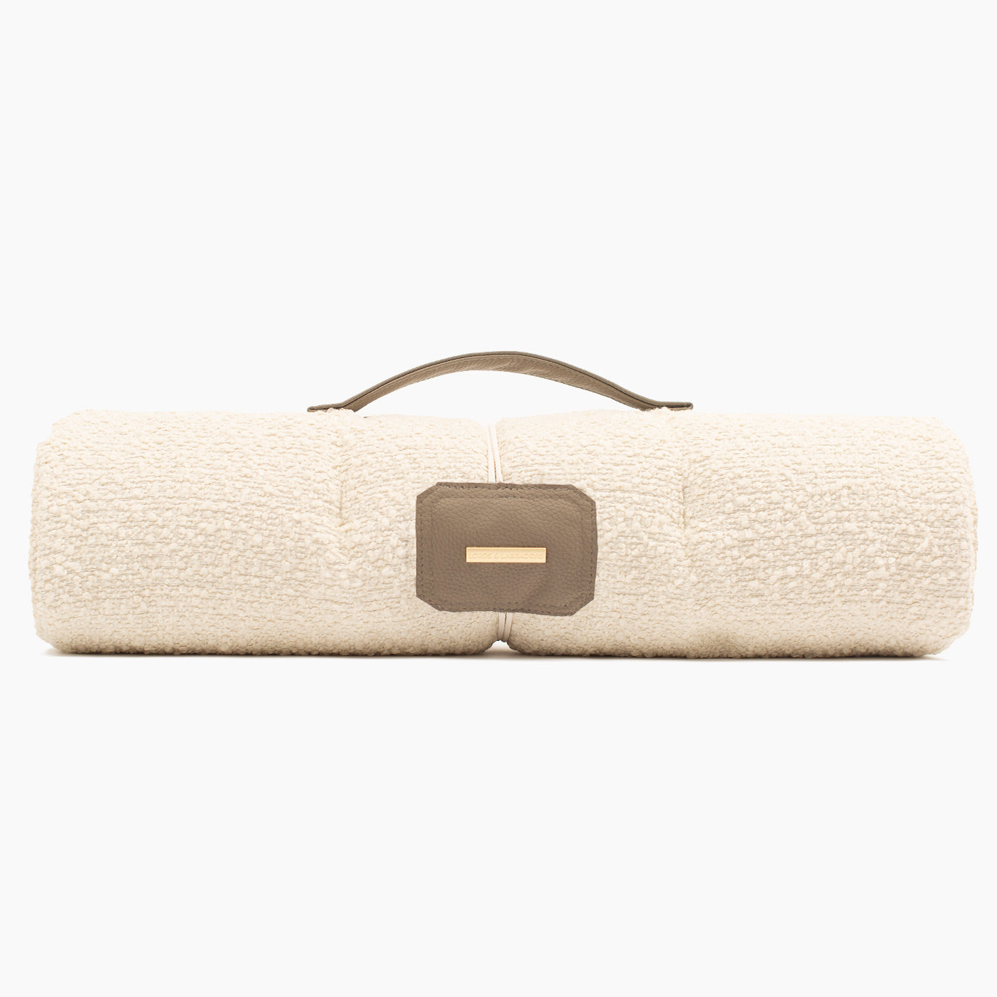 Embark on the perfect pet travel with our luxury Travel Mat in Ivory Boucle. Featuring a Carry handle for on the move once Rolled up for easy storage, can be used as a seat cover, boot mat or travel bed! Available now at Lords & Labradors US