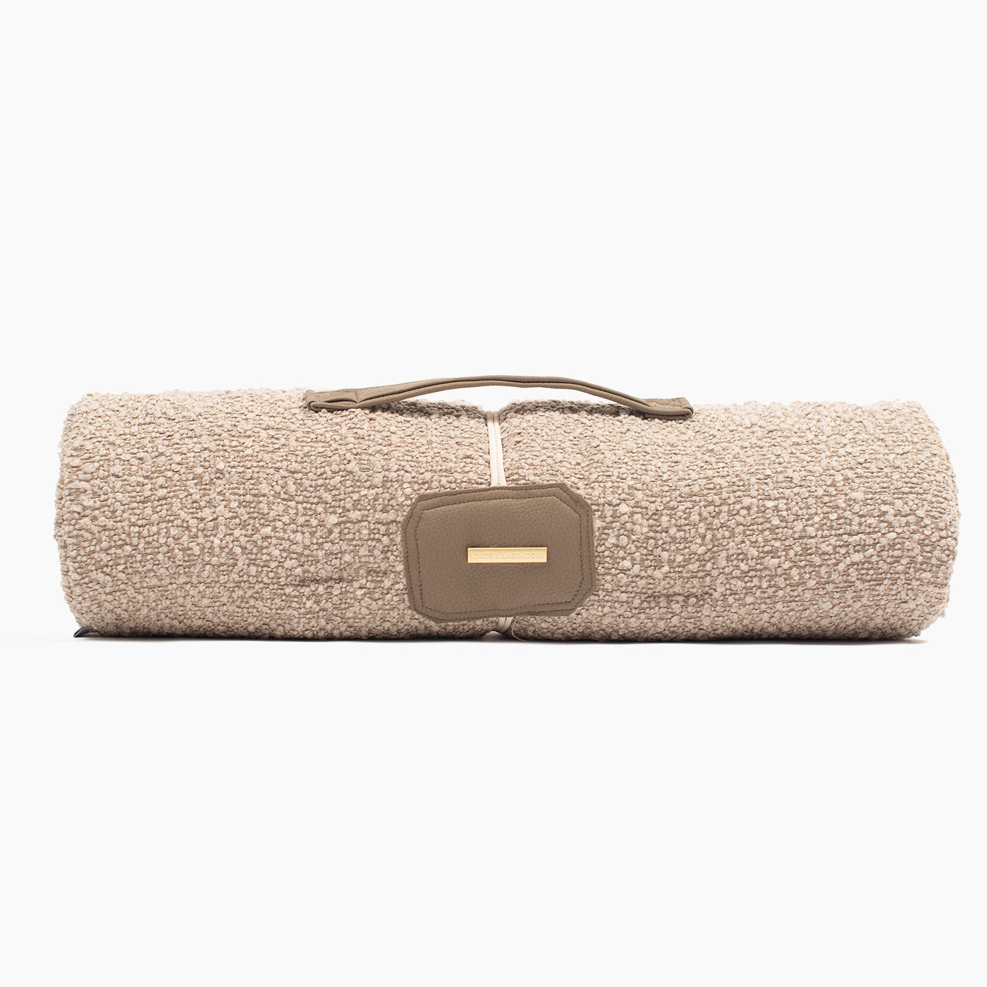 Embark on the perfect pet travel with our luxury Travel Mat in Mink Boucle. Featuring a Carry handle for on the move once Rolled up for easy storage, can be used as a seat cover, boot mat or travel bed! Available now at Lords & Labradors US