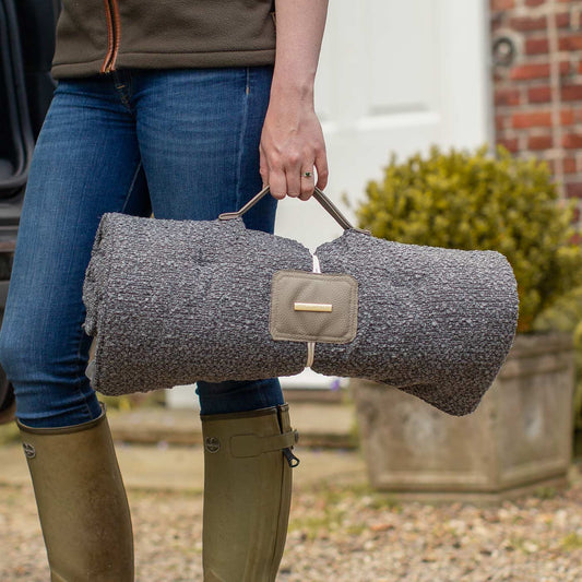 Embark on the perfect pet travel with our luxury Travel Mat in Granite Boucle. Featuring a Carry handle for on the move once Rolled up for easy storage, can be used as a seat cover, boot mat or travel bed! Available now at Lords & Labradors US