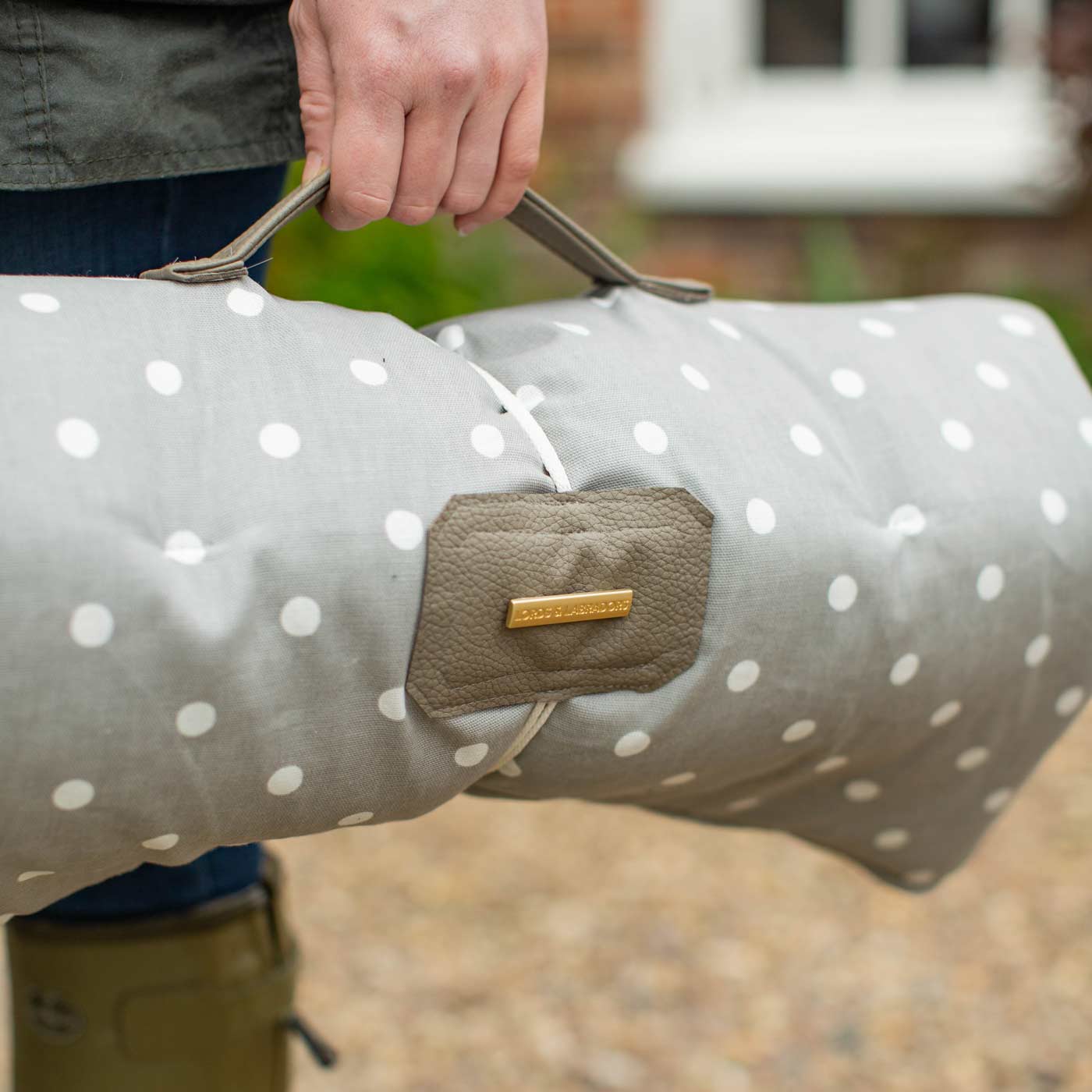 Embark on the perfect pet travel with our luxury Travel Mat in Grey Spot. Featuring a Carry handle for on the move once Rolled up for easy storage, can be used as a seat cover, boot mat or travel bed! Available now at Lords & Labradors US