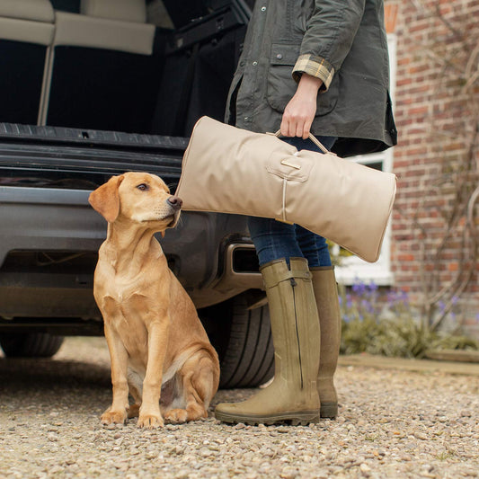 Embark on the perfect pet travel with our luxury Travel Mat in Rhino Sand. Featuring a Carry handle for on the move once Rolled up for easy storage, can be used as a seat cover, boot mat or travel bed! Available now at Lords & Labradors US