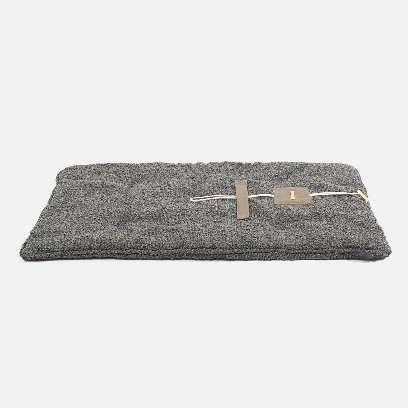 Embark on the perfect pet travel with our luxury Travel Mat in Granite Boucle. Featuring a Carry handle for on the move once Rolled up for easy storage, can be used as a seat cover, boot mat or travel bed! Available now at Lords & Labradors US