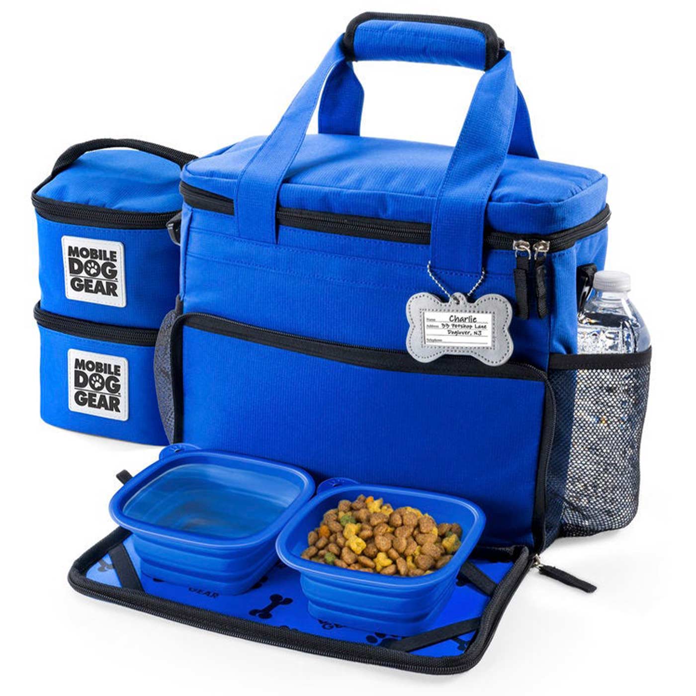 Discover, Mobile Dog Gear Week Away Bag, in Blue. The Perfect Away Bag for any Pet Parent, Featuring dividers to stack food and built in waste bag dispenser. Also Included feeding set, collapsible silicone bowls and placemat! The Perfect Gift For travel, meets airline requirements. Available Now at Lords & Labradors US
