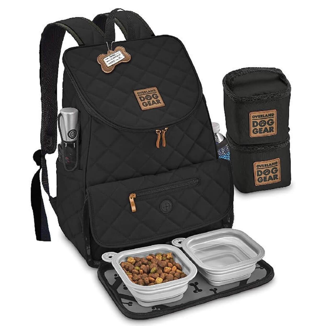 Discover, Mobile Dog Gear Weekender Backpack, in Black. The Perfect Away Bag for any Pet Parent, Featuring dividers to stack food and built in waste bag dispenser. Also Included feeding set, collapsible silicone bowls and placemat! The Perfect Gift For travel, meets airline requirements. Available Now at Lords & Labradors US