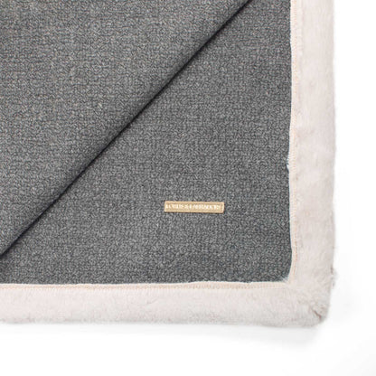 Present your furry friend with our luxuriously thick, plush blanket for your pet. Featuring a reverse side with hardwearing woven fabric handmade in Italy for the perfect high-quality pet blanket! Essentials Herdwick Blanket In Graphite, Available now at Lords & Labradors US